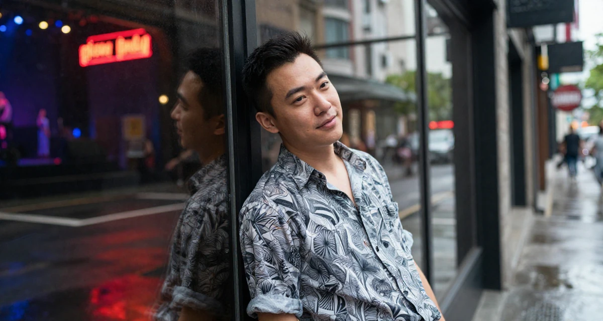 A gentle and kind male Previously a bartender, now expressing nightlife energy through content in their 42, sharing the journey of perimenopause health, wearing a relaxed fit patterned shirt, shivering slightly in a concert hall.