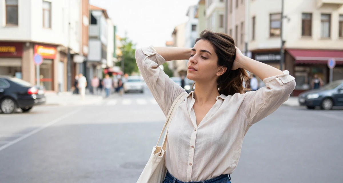 A lazy Female From Ankara Türkiye, holds a degree in international trade in their 31, enjoying the fruits of labor from the 20s, wearing a lightweight chiffon blouse slightly unbuttoned, carrying a tote bag in a busy intersection.