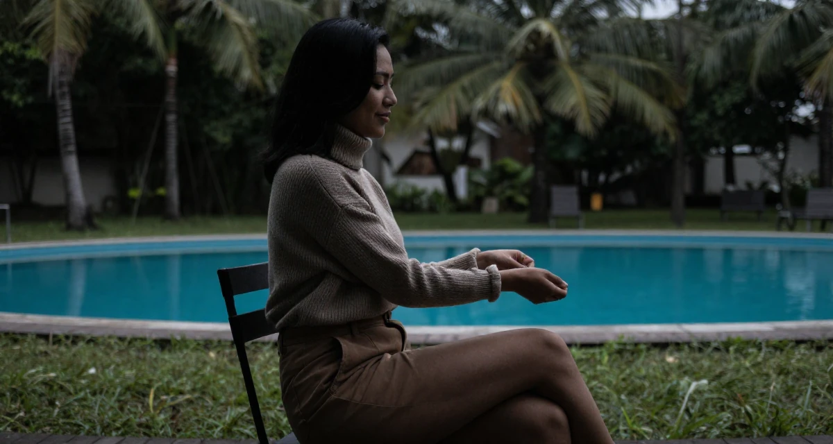 A friendly Female From Jakarta Indonesia, majored in fashion merchandising in their 28, facing that growth sometimes plateaus for months, wearing a turtleneck sweater tucked into high-waisted shorts, rolling up sleeves in a quiet park.