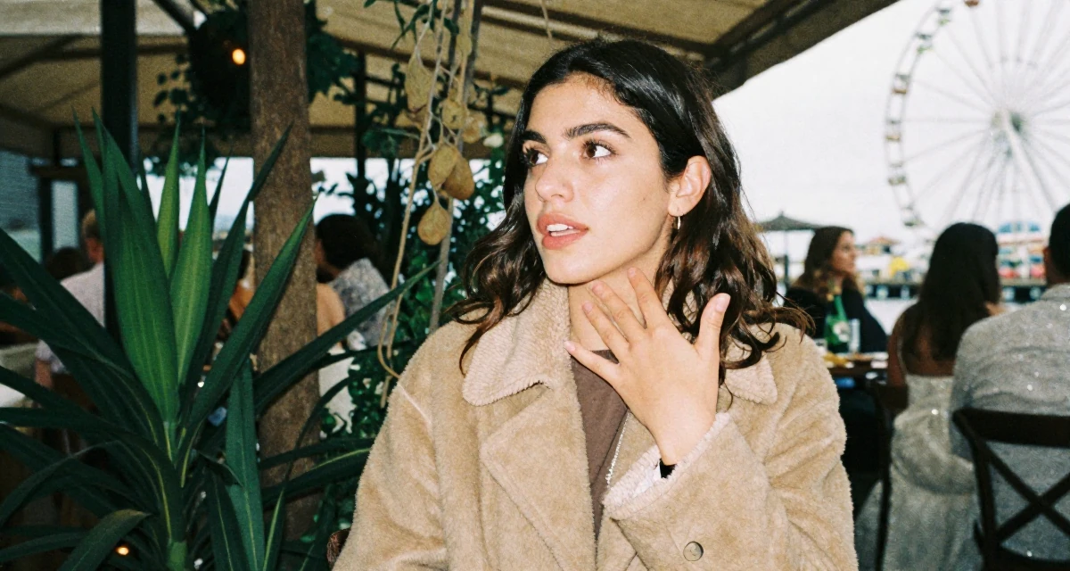 A ambitious Female From Argentina, based in Buenos Aires, graduated from a media institute majoring in flirtatious content styling in their 33, exploring luxury travel and fine living, wearing a warm winter layered look, gesturing while talking in a wedding venue.